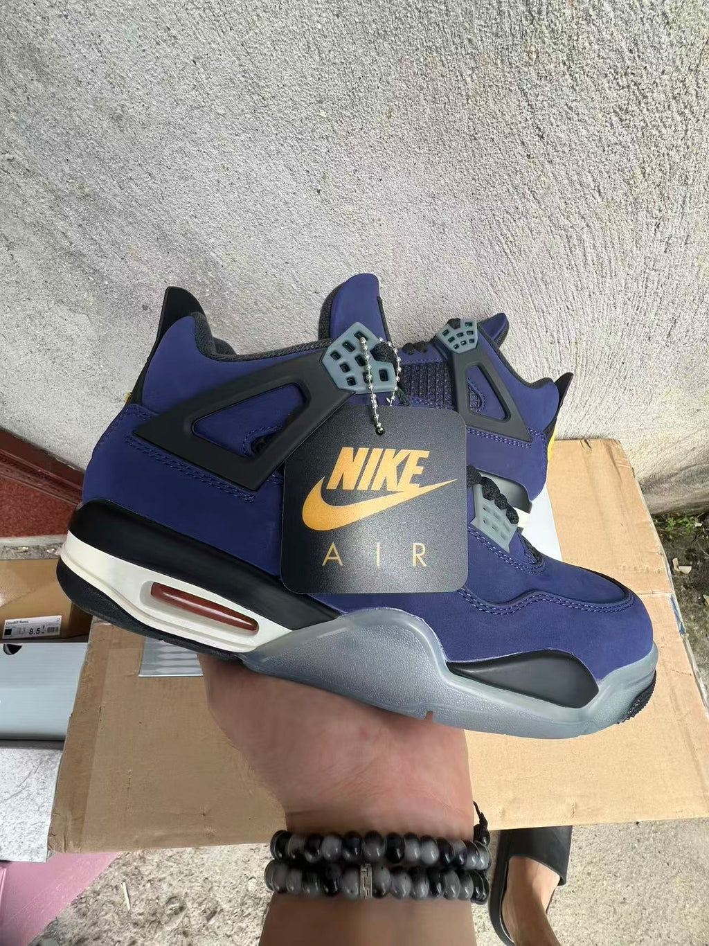 the Air Jordan 4 Retro "Lakers"