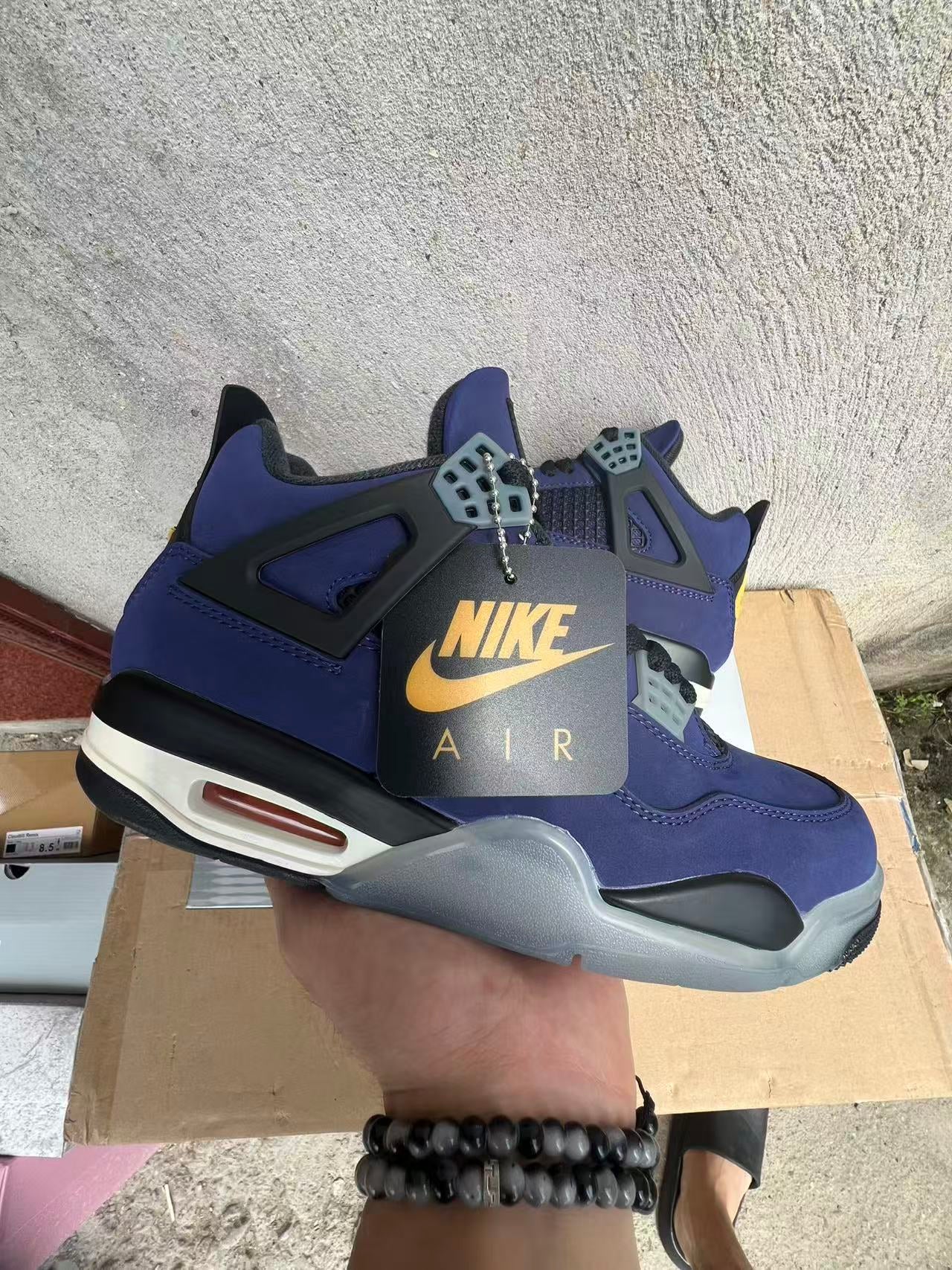 the Air Jordan 4 Retro "Lakers"