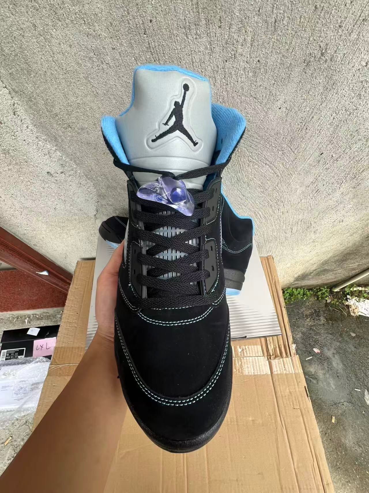 Air Jordan 5 Retro "Black University Blue" or "Black Carolina"